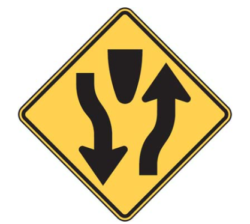 Two separate roads by median ahead, keep to the right sign for G1 license exam preparation on CanDriveHub